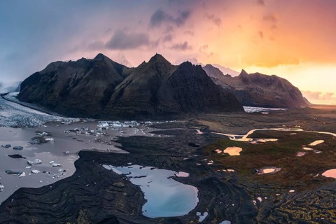 Captivating sunset lighting up the rugged landscape around Vatnajökull Glacier, located within