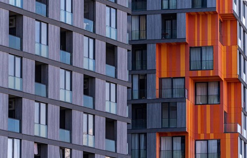 This image captures the essence of modern suburban architecture, featuring a blend of concrete,