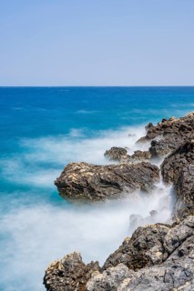 Romantic view over the sea in Koromacna Bay on a sunny day with rough seas on the island of Cres,