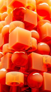 An engaging array of 3D geometric shapes in fiery orange tones combines spheres and cubes, creating