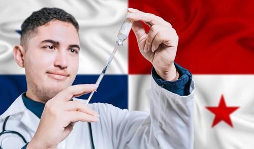 Doctor holding syringe on Panama flag background. Medical professional holding syringe with