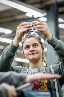 Remscheid, North Rhine-Westphalia, Germany - Trainee woman in metalworking here a materials tester