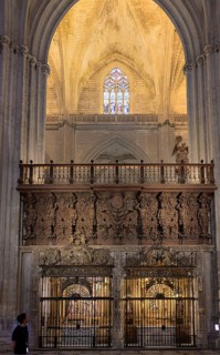 Impressive Gothic church architecture with ornate decorations and light effects, Seville,