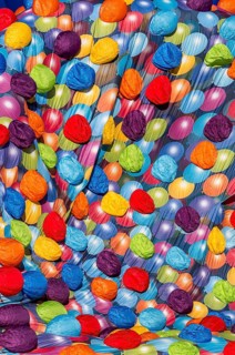 A bright and colorful image featuring a multitude of balloon patterns in a hot air balloons