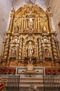 Elaborately designed baroque altar with golden sculptures and decorations, Seville
