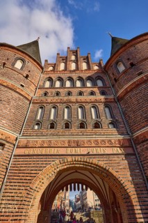 City gate Lübeck Holstentor, inscription Concordia domi foris pax with the meaning harmony inside