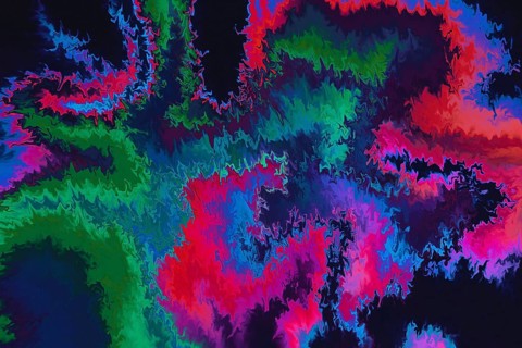 This image showcases a vivid abstract design featuring electric wave patterns in a dynamic array of