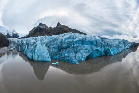 Captivating view of the expansive Vatnajökull Glacier, reflecting in calm waters at Vatnajökull