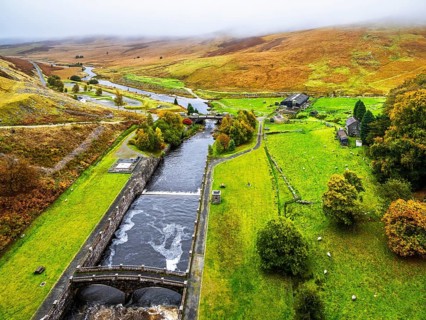 Autumn colors over Claerwen Dam, Claerwen Valley, Elan Valley Reservoir, Rhayader, Powys, Wales, UK