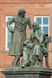 Brothers Grimm national monument, standing Jacob and sitting on the chair Wilhelm, brothers, bronze
