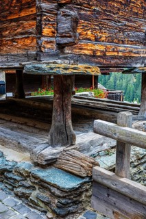 Old barn on wooden supports and stone slabs, historic village centre, Grimentz, Val d'Anniviers,