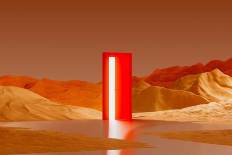 A bright, red door rests in the middle of a surreal desert landscape. A light glows from the door,