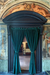 Passageway with velvet curtain in the upper rooms of the Villa del Principe, Palazzo di Andrea
