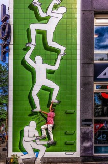 Artwork from the Rotterdam Make It Happen street art campaign in the city center, invites