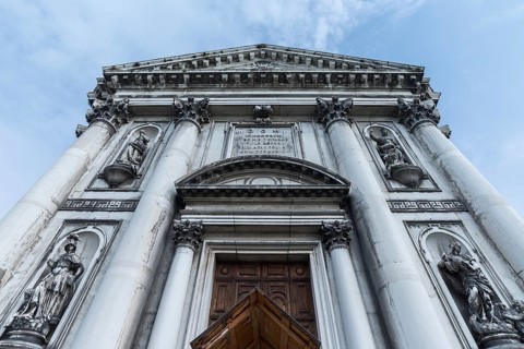Allegories on the main façade of the church of Santa Maria del Rosario, 17th century, Venice,
