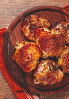 Fried chicken thighs, with spices, homemade, no people