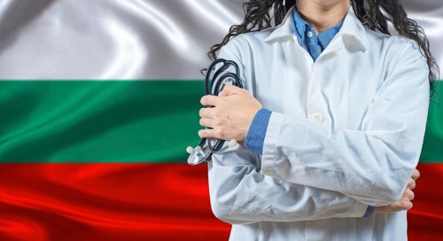 Healthcare professional with Bulgaria flag background. Professional doctor holding stethoscope on