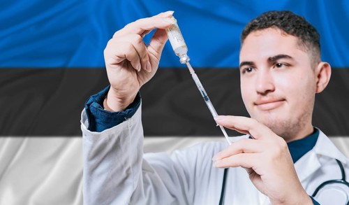 Doctor holding syringe on Estonia flag background. Medical professional holding syringe with