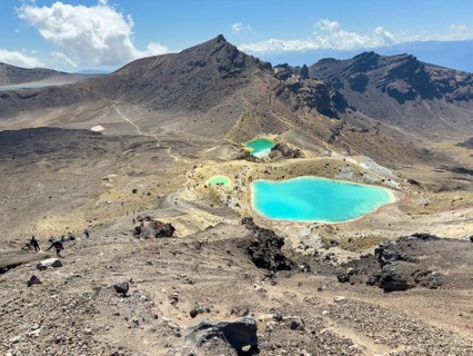 On the hiking trail of the Tongariro Alpine Crossing in Tongariro National Park with a view of the