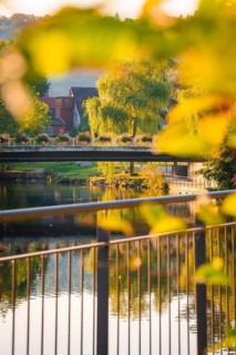 Bridge over Nagold in autumn, Calw, Black Forest, Germany