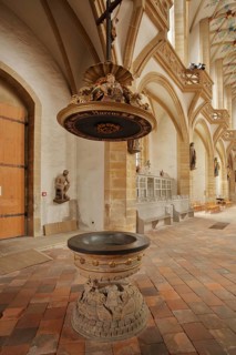 Interior view with baptismal font of the Romanesque Cathedral of St. Mary, Freiberg, Saxony,