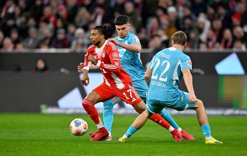 Duel, action Michael Olise FC Bayern Munich FCB (17) against Alexander Prass TSG 1899 Hoffenheim