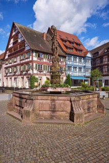 Market fountain with half-timbered houses in Gengenbach, Black Forest, Ortenaukreis,