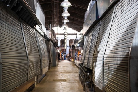 Closed market stalls in the Mercat de la Boqueria, famous market on the Ramblas in Barcelona, Spain
