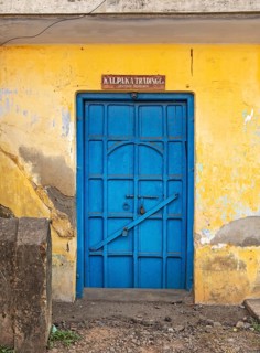Street scene with blue door, Matancherry, Jew Town, Cochin, Kerala, India