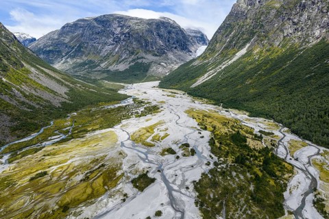 The widely branching arms of river Jostedalsola, Jostedal river, a glacial river originating in the