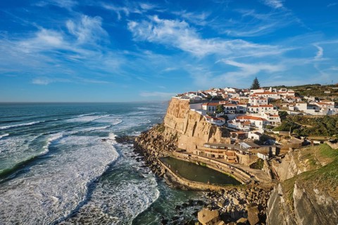 Explore the stunning seaside village of Azenhas do Mar nestled on high cliffs along the Atlantic