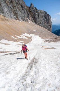 Mountaineer on a snowfield, mountain basin with glacier remnant of the Höllentalferner, Höllental,