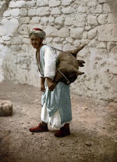 Water carrier, water seller with a goat bellows in Jerusalem, today Israel, Historical, digitally