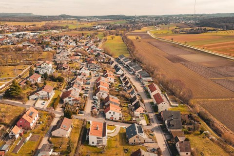 Aerial view of a residential development in a rural area with extensive fields, Ötisheim, Enzkreis,