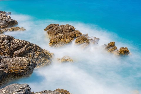 Romantic view over the sea in Koromacna Bay on a sunny day with rough seas on the island of Cres,