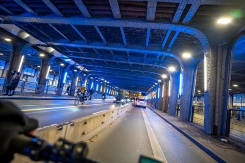 Cycling in the city, in the dark, in the evening, cycling underpass at the main train station, in