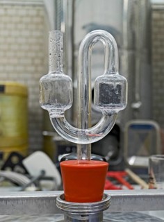 Fermentation tubes on sealed steel barrels for the fermentation of alcoholic beverages, Germany