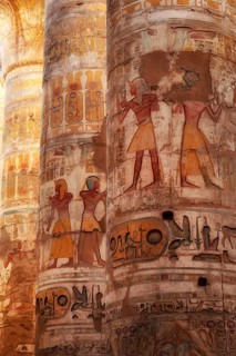 Ancient Egyptian Pharaonic Hieroglyphic relief details on columns of the Great Hypostyle Hall of