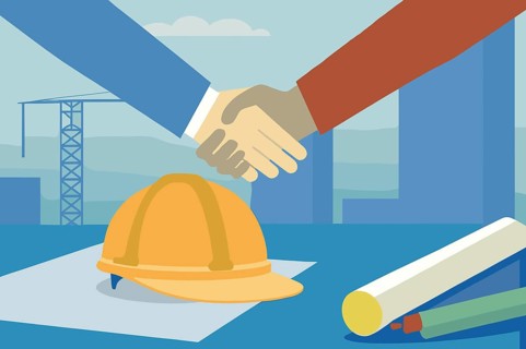 Two individuals engage in a handshake to signify a partnership in real estate while surrounded by