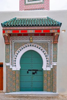 Decorated green door, entrance to mosque in medina of the city Tangier, Tanger, Morocco
