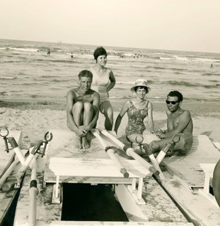 Historical photo summer 1961, tourists, beach, Rimini, Italy