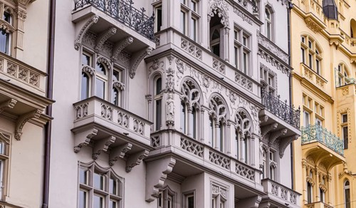 Detailed view of historic Prague facades, showcasing intricate designs and architectural elegance.