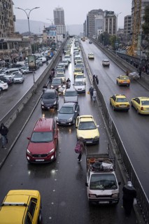Damascus, Syria. December 6th 2025. A wet and busy with traffic Al Thawra street in downtown