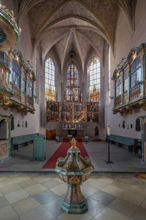 Chancel with baptismal font of the Protestant Church of St. Mary, baroqueised in the 18th century,