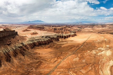 An expansive aerial shot capturing the rugged and unique terrain of Goblin Valley State Park in