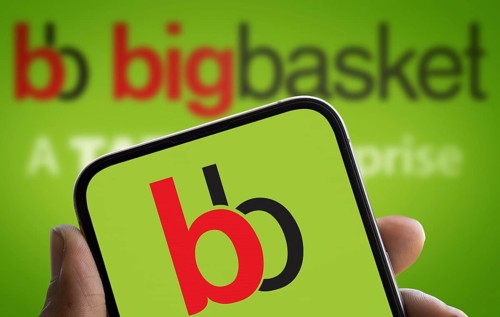BigBasket logo is displayed on smartphone. BigBasket is an Indian online grocery.