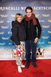 Marie Steinmann and Tom Tykwer at the premiere of the 20th Original Roncalli Weihnachtscircus in