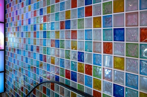 Wall with colored glass blocks in a stairwell, Nuremberg, Middle Franconia, Bavaria, Germany