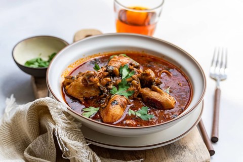 A flavorful bowl of traditional Georgian chakhokhbili chicken stew made with tender chicken pieces