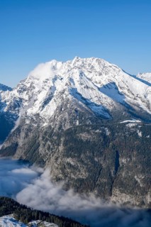 View of sea of clouds and snow-covered mountains, mountain panorama with Watzmann, from the Jenner,